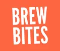 Weißer Schriftzug 'BREW BITES' in Großbuchstaben auf orangefarbenem Hintergrund