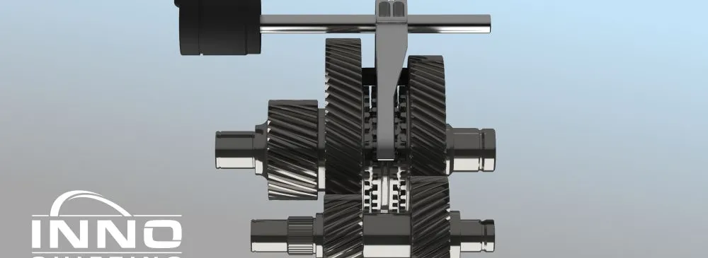 Zahnräder und Wellen eines mechanischen Getriebes mit dem Schriftzug 'INNO SHIFTING'